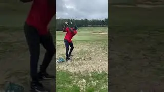 At the range hitting golf balls
