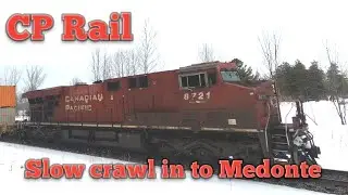 CP Rail MacTier Subdivision crawling in to Medonte 8721S, / 8153 / 8715. March 14, 2022