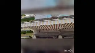 ROLLING SUNSHADE IN FRONT OF SHOPS