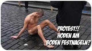 K&uuml;nstler nagelt Hoden am Boden fest - Hilfe nach Taifun - Kid-Batman