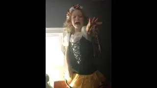 Molly in butterfly costume dancing