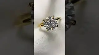 Round Cut Solitaire Four Claw Engagement Ring in Yellow Gold