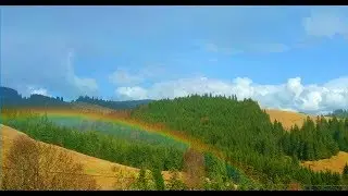 The Rainbow Timelapse Sky In Karpathians / Дождь и радуга в Карпатах. Кривополье