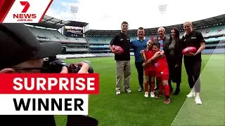 Young footy fan wins surprise AFL award | 7NEWS