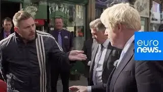 'You're playing games!' Heckler ruins Boris Johnson's charm offensive in the north of England