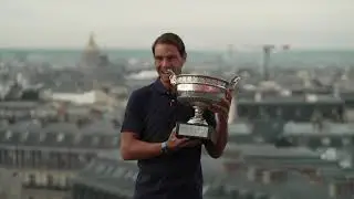 Nadal mimics famous 'biting trophy' pose as he shows off French Open title in Paris