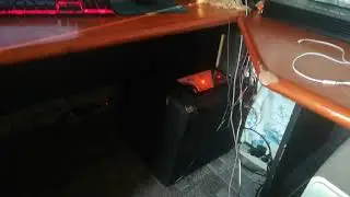 Сабвуфер автомобильный JBL GT-12BP в комнате.