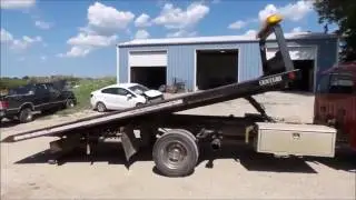 1999 Ford F550 rollback truck for sale | no-reserve Internet auction August 31, 2016