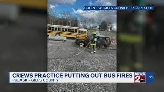 Crews practice putting out bus fires