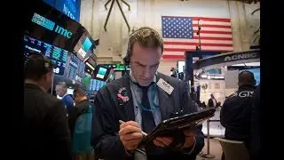 Industrials drag Wall Street lower