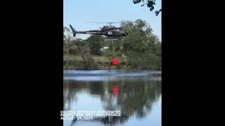 MOMENT: Firefighting helicopter crashes into pond while collecting water in France