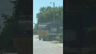 Old clip of a Mack MRU McNeilus Atlantic Front Loader Garbage Truck