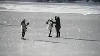 New Yorkers enjoying freezing temperatures on frozen Central Park Lake