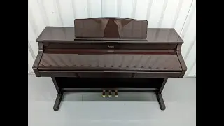 Roland KR575 intelligent digital piano and stool in polished glossy mahogany finish stock # 23194
