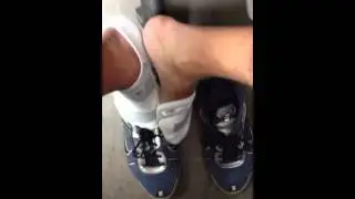 Nike shox and white no show under armour socks