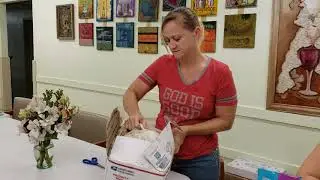 Son Shine Lighthouse opening an exploding box of wool