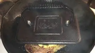 Searing A Butter-Basted Steak With A Lodge Cast Iron Grill Press