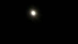bright white moon with thick clouds and glow around it. september, 10, 2011,  part 2