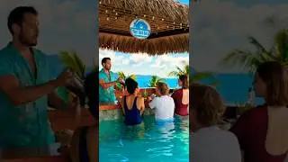 Bray Chibblers serves drinks in the pool, vacation vibes unlocked.