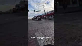 Biker Caught by Cop Doing a Wheelie