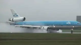 AWESOME KLM MD11 POWERFUL ENGINES SPRAY RUNWAY DURING LANDING