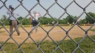 Gabi Burns hits a long double with the mizuno crbn1.