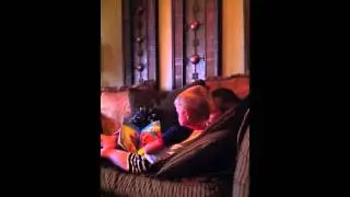 Ethan reading to Evan 1