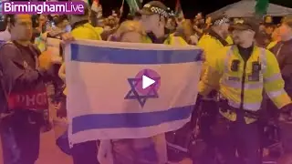 Woman Holding Israeli Flag Is Escorted From Angry Crowds Outside Villa Park