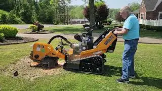 A stump grinder rented from Home Depot 