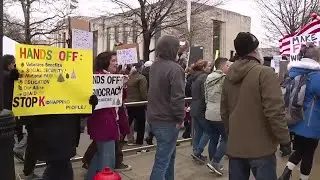 Thousands protest President Trump, Elon Musk in Michigan