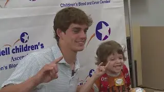 Arch Manning teams up with charity to give childhood cancer patients iPads in Austin