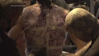 Tattoo artists make their mark in Paris at one of the world's largest exhibitions celebrating body a