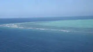 Private plane landing at Amanpulo