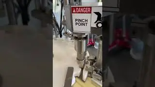 BID ON EQUIPMENT Item: 399722 - Small Bottle Rotary Filler, Unscrambler, Capper Line(video 2)