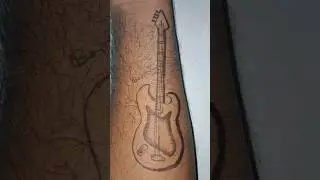 Tattoo Art Guitar #tattoo #guitar #viraltattoo #tattooshorts #temporarytattoo