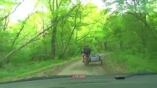 Russian police pursue motorcycle with sidecar
