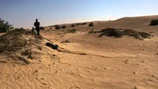 RC car dune bashing in Dubai desert.