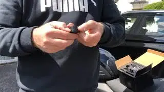 Bar end mirror fitting on the Trident