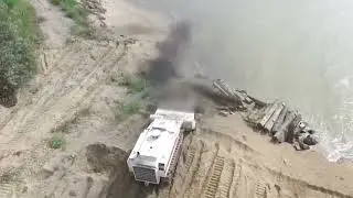 Uran 6 Robot clears several mines from a beach in Mariupol