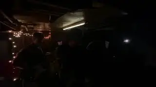 dudes playing psychedelic rock in a basement