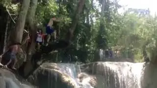 Ropeswinging into kuang si falls, Luang Prabang