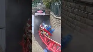 zooming by. #superman #thrills #tunnel #track #train #rollercoaster