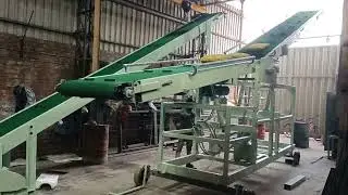 Portable Bag Stacker with Hydraulic Arrangement.