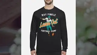 Ray Finkle laces out football camp shirt