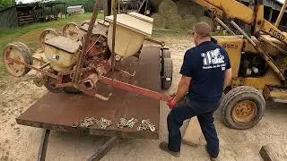 The 543 White Corn Planter is in pieces now, and got the wife ON A TRACTOR finally!!