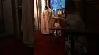 Low Mass with junior altar server.