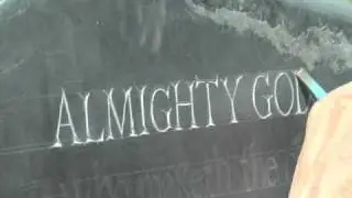 Gabriel Hummerstone carving a gravestone