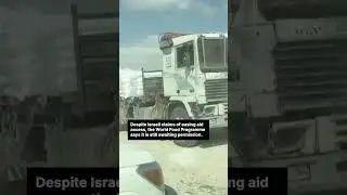 UN video shows guns fired at Gazans queuing for food