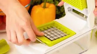 Овощерезка с AliExpress со множеством насадок и удобным отсеком