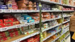 Two sis inside an Italian supermarket